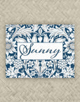 A NMJL Mahjong card cover sticker with a navy blue and white floral damask pattern, personalized with the name in dark blue script.